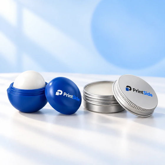 Blue spherical lip balm and silver balm tin with PrintSide logos.