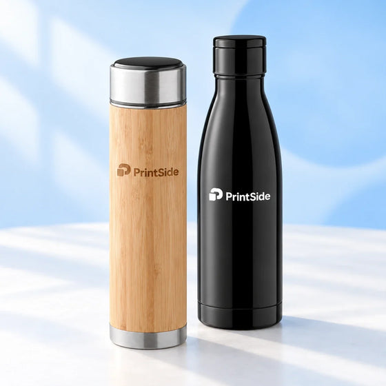 Bamboo-finish flask and black bottle with PrintSide logos.