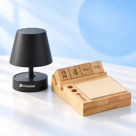 Black desk lamp and bamboo desk organiser with PrintSide logos.