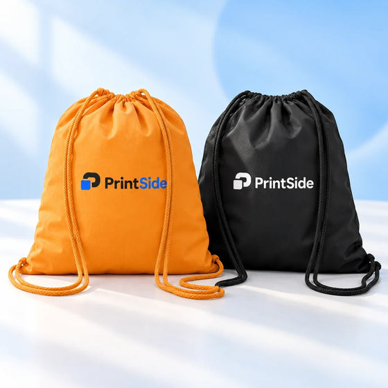 Orange and black drawstring bags with PrintSide logos.