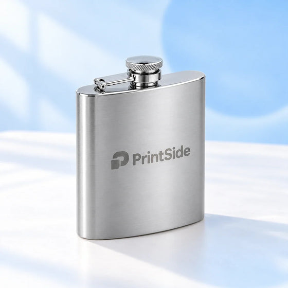 Brushed steel hip flask with an engraved PrintSide logo.