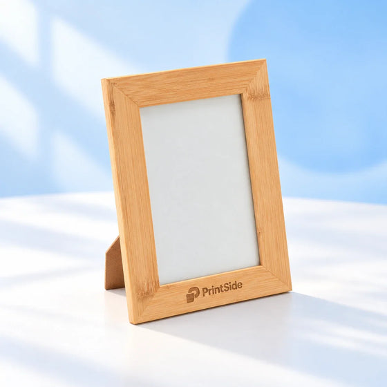 Bamboo photo frame with PrintSide engraving on the lower border.