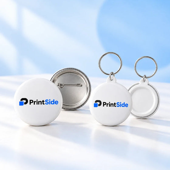 Round white pin badges and key ring buttons with PrintSide logos.