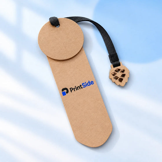 Kraft paper bookmark with black ribbon and a PrintSide logo.