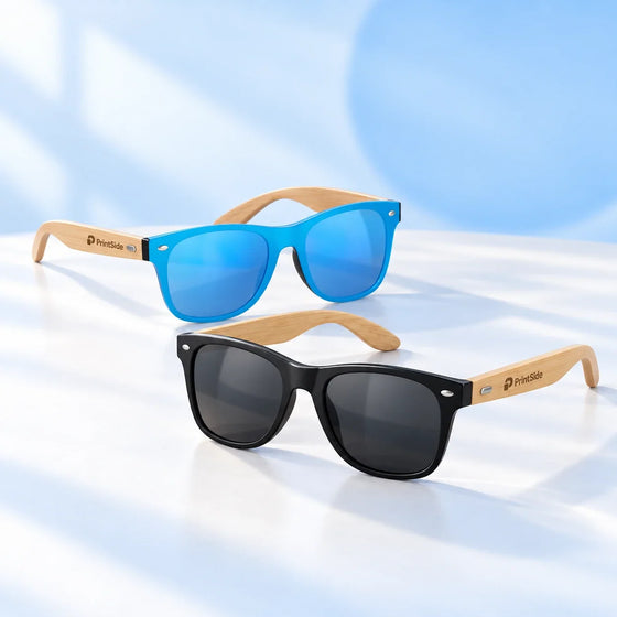 Blue and black sunglasses with bamboo arms and PrintSide engraving.