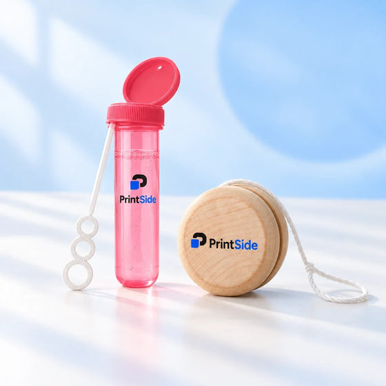 Pink bubble blower and natural wooden yoyo with PrintSide logos.