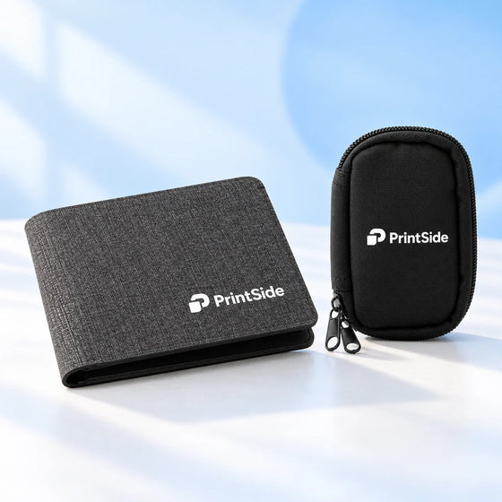 Charcoal wallet and black zip key case with PrintSide logos.